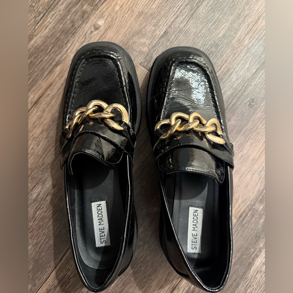 Steve Madden Glossy Black Loafers with Gold Accent